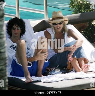 Exclusive!! Newly engaged Howard Stern and fiancee Beth Ostrosky relax at a Miami Beach hotel, 2/23/07.    [[tag mab]] Stock Photo