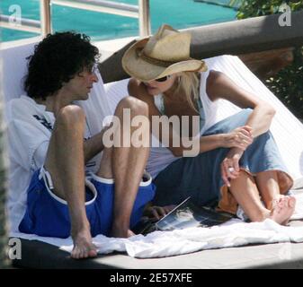 Exclusive!! Newly engaged Howard Stern and fiancee Beth Ostrosky relax at a Miami Beach hotel, 2/23/07.    [[tag mab]] Stock Photo