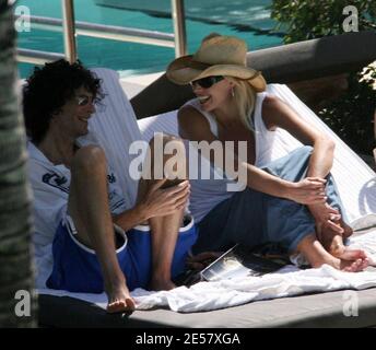 Exclusive!! Newly engaged Howard Stern and fiancee Beth Ostrosky relax at a Miami Beach hotel, 2/23/07.    [[tag mab]] Stock Photo