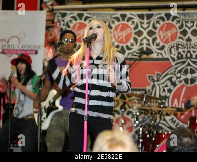 Multi-platinum singer songwriter Avril Lavigne performs a song at the album launch of her new album 'The Best Damn Thing'  at Virgin Megastore in Times Square, New York.  It is the Canadian pop-punk dynamo's third full-length studio album and is the  first album since 2004's eight-million selling 'Under My Skin', 4/17/07.   [[faa]] Stock Photo