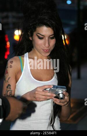 AVRIXPHOTO.COM UK Singer Amy Winehouse takes a stroll in New York with fiance Blake Fielder-Civil, stopping to sign autographs and pose for pictures with fans on the evening of the last of her sold-out shows at the Highline Ballroom. New York,NY. 5/9/07.  [[faa]] Stock Photo