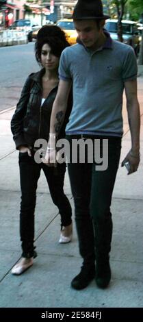 AVRIXPHOTO.COM UK Singer Amy Winehouse takes a stroll in New York with fiance Blake Fielder-Civil, stopping to sign autographs and pose for pictures with fans on the evening of the last of her sold-out shows at the Highline Ballroom. New York,NY. 5/9/07.  [[faa]] Stock Photo