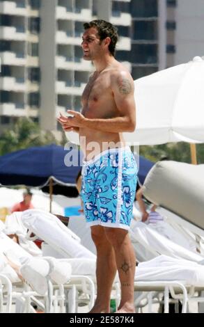 Italian soccer star Christian 'Bobo' Vieri and super hot girlfriend Melissa Satta enjoy the sun and surf on Miami Beach, Fla. 6/3/07.  [[tag]] Stock Photo