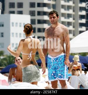 Italian soccer star Christian 'Bobo' Vieri and super hot girlfriend Melissa Satta enjoy the sun and surf on Miami Beach, Fla. 6/3/07.  [[tag]] Stock Photo