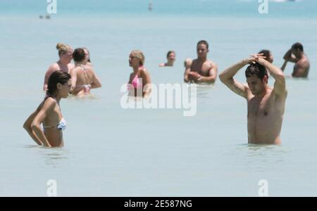 Italian soccer star Christian 'Bobo' Vieri and super hot girlfriend Melissa Satta enjoy the sun and surf on Miami Beach, Fla. 6/3/07.  [[tag]] Stock Photo