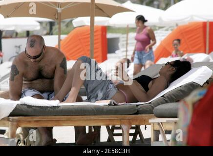 Exclusive!! Grammy Award-winning DJ/Producer and recording artist Roger Sanchez spends time on the beach with his partner. Miami, Fla. 7/7/07.    [[mab]] Stock Photo