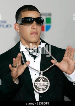 Daddy Yankee celebrates winning an award backstage at the Premios Juventud  Award show held at the Convocatiion Center in Coral Gables, Florida, on  September 22, 2005. (UPI Photo/Michael Bush Stock Photo - Alamy