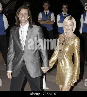 Jim Carrey and Jenny McCarthy arrive at the invitation-only party to welcome the Beckhams to LA. The event was hosted by Tom Cruise and Katie Holmes and was held at the Museum Of Contemporary Arts, Geffen Contemporary, in downtown LA. Guests included Will and Jada Smith, Brooke Shields, director Ron Howard and Eva Longoria. Los Angeles, Calif. 7/22/07.   [[wam]] Stock Photo