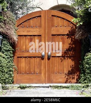 Exclusive!! Christina Aguilera and husband Jordan Bratman put their own stamp on rocker Ozzy Osbourne's home which they recently purchased. The home is now painted pink and gone is the gothic door-knocker from the wooden gates. Beverly Hills, Calif. 9/16/07.    [[rac ral]] Stock Photo