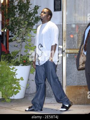 Exclusive!! P Diddy puts in a hard day at the office. Diddy, dressed down in jeans, flip flops and socks, was spotted leaving his Bad Boy Entertainment headquarters after dark. New York, NY. 10/23/07.   [[faa]] Stock Photo