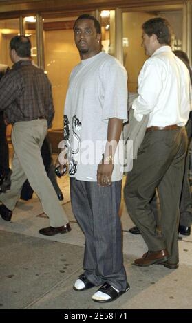 Exclusive!! P Diddy puts in a hard day at the office. Diddy, dressed down in jeans, flip flops and socks, was spotted leaving his Bad Boy Entertainment headquarters after dark. New York, NY. 10/23/07.   [[faa]] Stock Photo