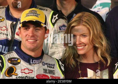 Jimmie Johnson and wife Chandra celebrate winning the 2007 NASCAR Nextel Cup championship after the running of the NASCAR Nextel Ford 400 at Homestead-Miami Speedway, in Homestead, FL. 11/18/07.   [[fam bam]] Stock Photo