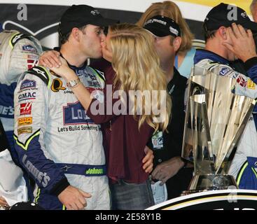 Jimmie Johnson and wife Chandra celebrate winning the 2007 NASCAR Nextel Cup championship after the running of the NASCAR Nextel Ford 400 at Homestead-Miami Speedway, inHomestead, FL. 11/18/07.   [[fam bam]] Stock Photo