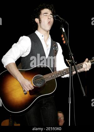 Exclusive!! American pop band The Jonas Brothers perform a free concert at the Rockaway Townsquare Mall. Britney Spears' former bodyguard, Big Rob is on hand to make sure Kevin, Joe and Nick Jonas are safe and sound at the show. Rockaway, NJ. 12/29/07.   [[faa]] Stock Photo