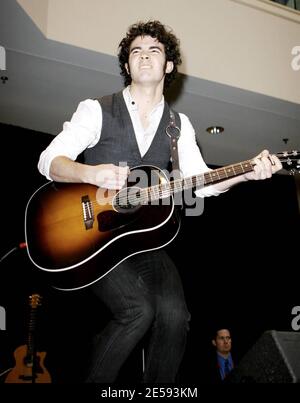 Exclusive!! American pop band The Jonas Brothers perform a free concert at the Rockaway Townsquare Mall. Britney Spears' former bodyguard, Big Rob is on hand to make sure Kevin, Joe and Nick Jonas are safe and sound at the show. Rockaway, NJ. 12/29/07.   [[faa]] Stock Photo