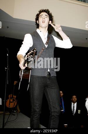 Exclusive!! American pop band The Jonas Brothers perform a free concert at the Rockaway Townsquare Mall. Britney Spears' former bodyguard, Big Rob is on hand to make sure Kevin, Joe and Nick Jonas are safe and sound at the show. Rockaway, NJ. 12/29/07.   [[faa]] Stock Photo