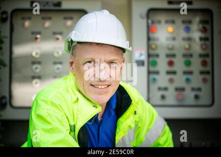 maintenance engineer, Solar energy systems engineer perform analysis solar panels Stock Photo