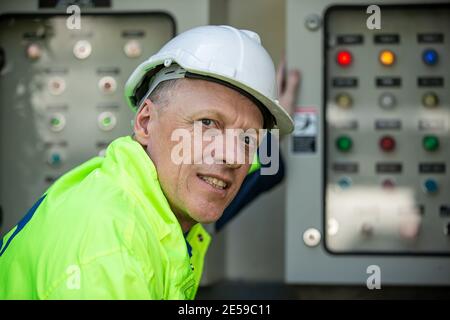 maintenance engineer, Solar energy systems engineer perform analysis solar panels Stock Photo