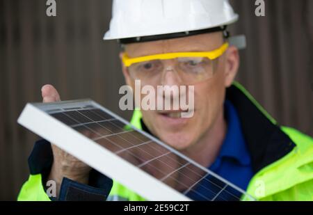 maintenance engineer, Solar energy systems engineer perform analysis solar panels Stock Photo