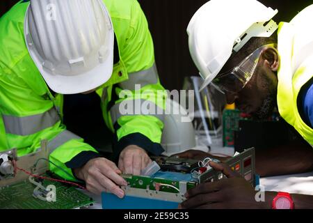 maintenance engineer, Solar energy systems engineer perform analysis solar panels Stock Photo