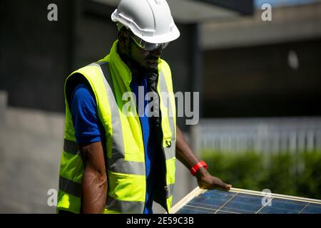 maintenance engineer, Solar energy systems engineer perform analysis solar panels Stock Photo