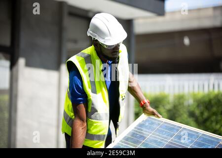 maintenance engineer, Solar energy systems engineer perform analysis solar panels Stock Photo