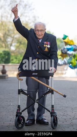 File photo dated 16/04/2020 of the then 99-year-old war veteran Captain Tom Moore at his home in Marston Moretaine, Bedfordshire, after he achieved his goal of 100 laps of his garden - raising more than 12 million pounds in support of the NHS during the coronavirus pandemic. Saturday January 30 marks the one year anniversary of the earliest known death from coronavirus in UK. Issue date: Wednesday January 27, 2021. Stock Photo
