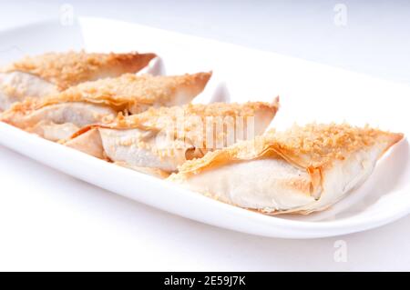 hors doeuvres bite sized baked snacks Stock Photo