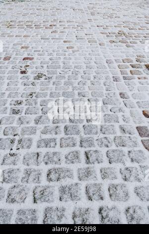 Cobblestone under snow for background Stock Photo