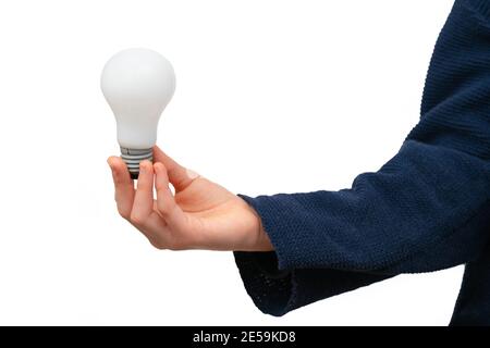 Close up of hand holding light bulb on white background. Stock Photo