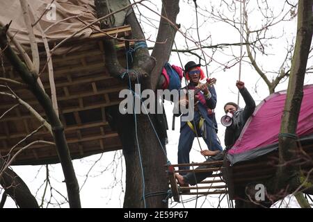 Protesters in trees at the encampment in Euston Square Gardens in central London, where HS2 Rebellion protesters have built a 100ft tunnel network, which they are ready to occupy, after claiming the garden is at risk from the HS2 line development. Picture date: Wednesday January 27, 2021. Stock Photo