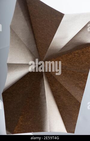 Beige paper geometry composition. Abstract background. Macro shot. Copy space. Stock Photo