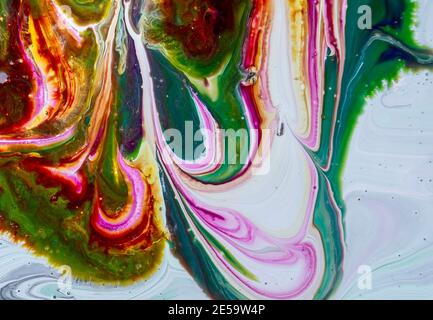 An abstract work of art. Fashionable wallpaper. The ink colors are surprisingly bright, luminous, translucent, free flowing and quickly dry. Stock Photo