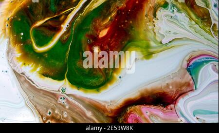 An abstract work of art. Fashionable wallpaper. The ink colors are surprisingly bright, luminous, translucent, free flowing and quickly dry. Stock Photo