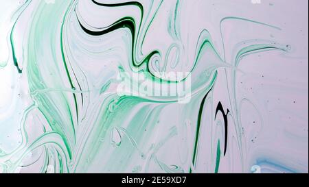 An abstract work of art. Fashionable wallpaper. The ink colors are surprisingly bright, luminous, translucent, free flowing and quickly dry. Stock Photo