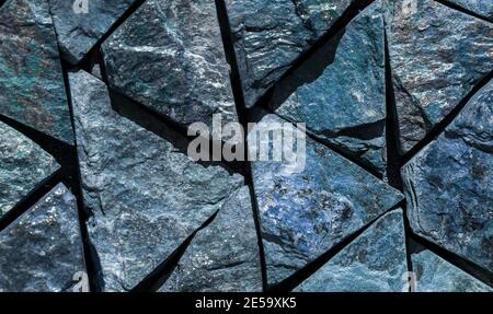 Monochrome surface of granite wall close-up. Natural decorative stone background Stock Photo