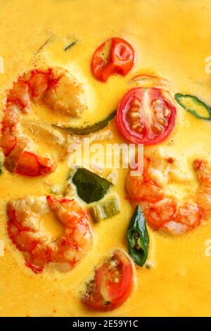 Prawn moilee, delicious south Indian curry shrimp soup with lime Stock Photo