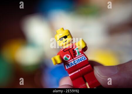 Bangkok, Thailand - January 27, 2021 : Lego Minifigure in a hand. Stock Photo