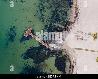 Drone View of Wooden Pier in Sandvig on Bornholm Island Stock Photo