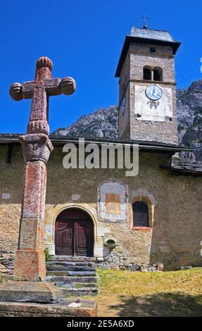 church with sundial at the valley of Nevache, France, Hautes Alpes, Plampinet Stock Photo