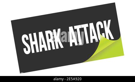 SHARK  ATTACK text written on black green sticker stamp. Stock Photo