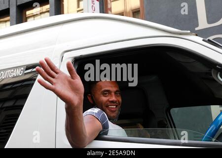 Cape Town taxi driver waving , Long Street, Cape Town, South Africa. Stock Photo