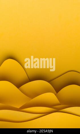 graphic abstract image of yellow origami pattern made of cut sheets of paper Stock Photo