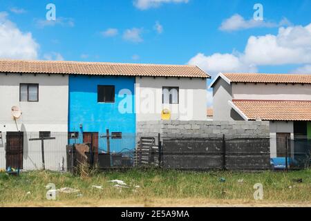 Government subsidy housing (commonly known as RDP houses) along the N2 highway near Cape Town, South Africa. Stock Photo