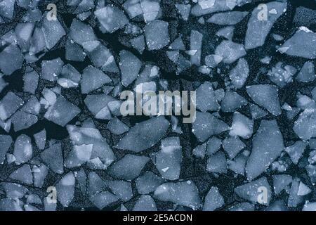 Top down view of ice chunks on sea Stock Photo