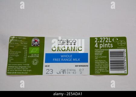 Label from Bottle of 4 pints of Tesco Organic Whole Free Range Milk Stock Photo