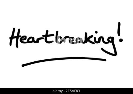 Heartbreaking! handwritten on a white background. Stock Photo