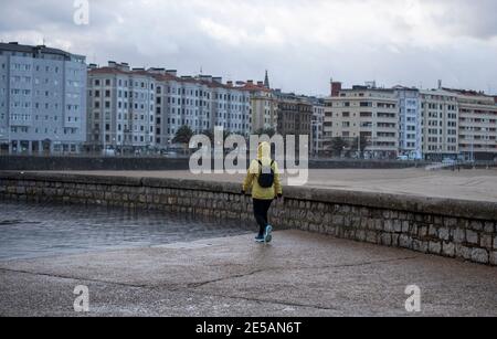 walking down the street on a rainy day Stock Photo