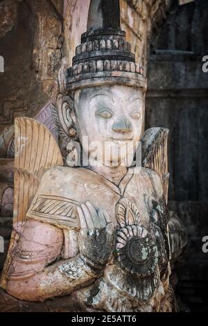 Detail of a nat statue (angel of spirit) in Tharkhaung buddhist monastery  in Burma, Myanmar Stock Photo - Alamy