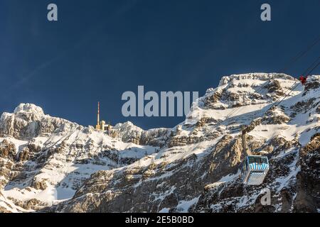The snow-covered top of the Saentis with summit station and cable car, Canton Appenzell Ausserrhoden, Switzerland Stock Photo